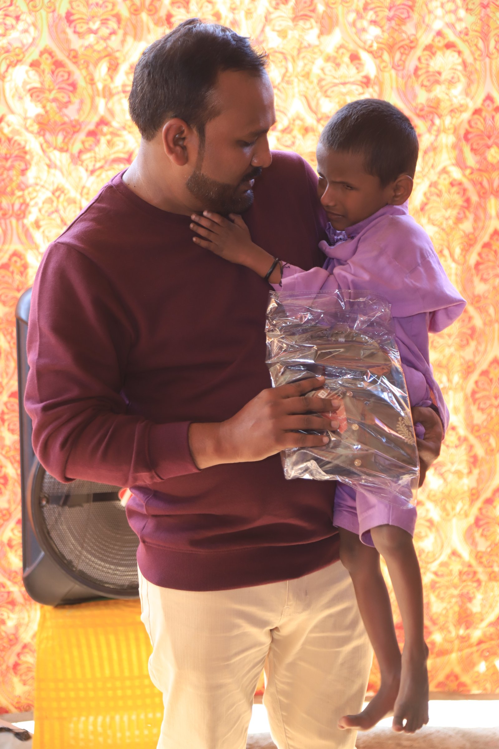 Handing out gifts to children in the village